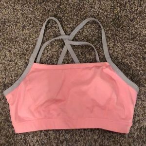 Pink and grey sports bra